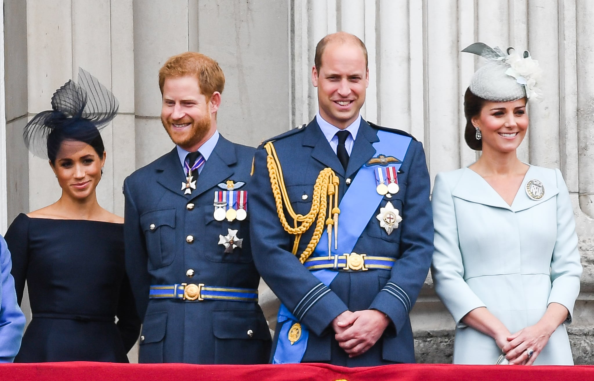 LONDON,  UNITED KINGDOM - JULY 1O:  Meghan, Duchess of Sussex, Prince Harry, Duke of Sussex, Prince William, Duke of Cambridge and Catherine, Duchess of Cambridge stand on the balcony of Buckingham Palace to view a flypast to mark the centenary of the Royal Air Force (RAF)  on July 10, 2018 in London, England. (Photo by Anwar Hussein/WireImage)