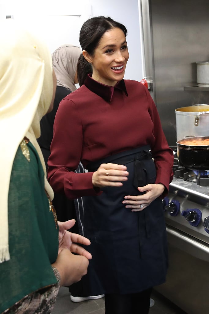 Meghan Markle Touching Baby Bump Pictures