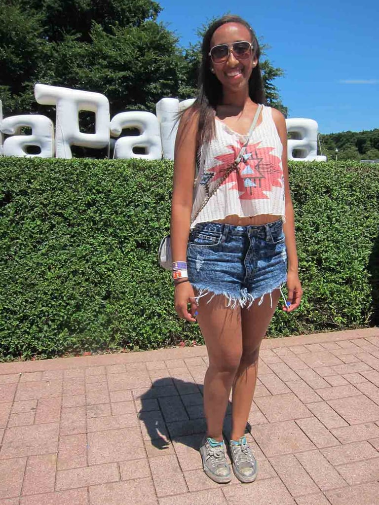 One of the more popular accessories on festivalgoers were worn, muddied sneakers. But Eden made sure to keep the rest of her look cute and clean with her tribal-print tank and frayed shorts.