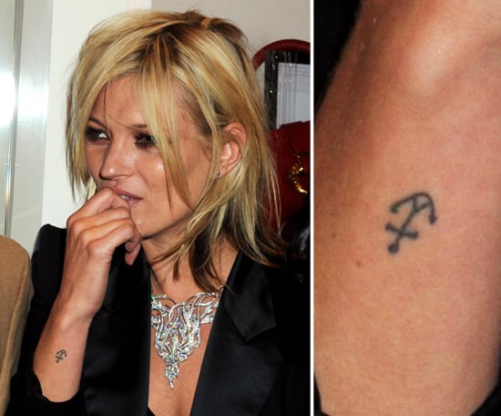 Kate Moss has a small anchor tattooed on the outside of her right wrist.
Kate Moss has a small anchor tattooed on the outside of her right wrist.
