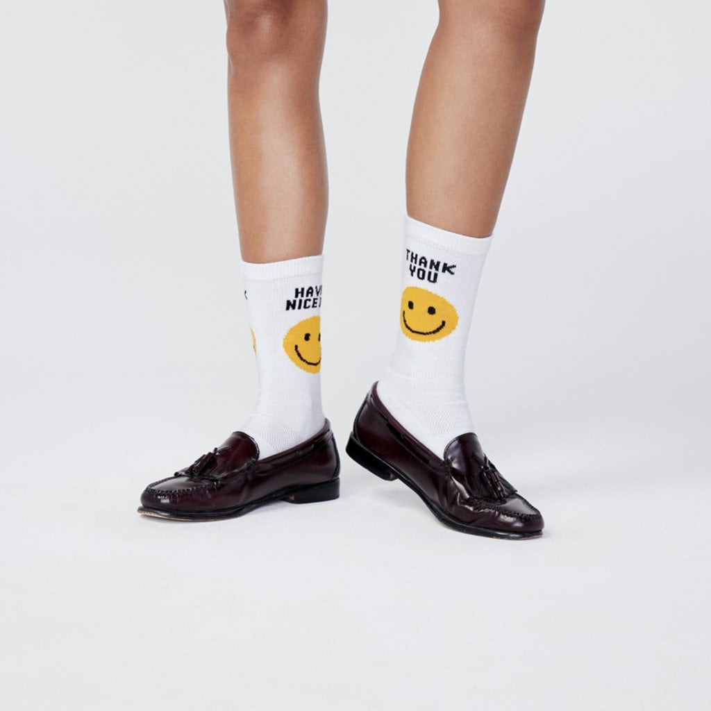 "Kule is a happy brand offering a fun, light approach to everyday pieces like socks and tees. I love that these Take Out Socks ($28) add a little uplifting wink to your look."