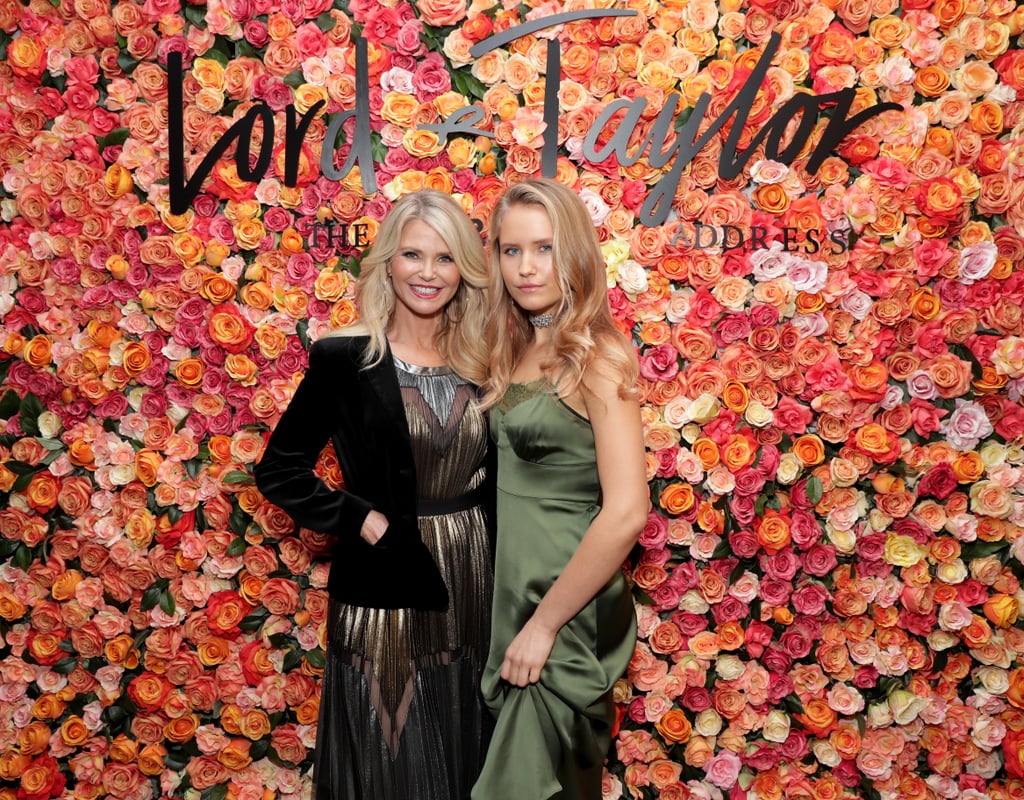 The resemblance between Christie Brinkley and her 18-year-old daughter Sailor gets more and more jaw-dropping every time we see the mother-daughter duo. On Thursday, the 62-year-old model brought Sailor to a charity event at the grand reopening of Lord and Taylor in Garden City, New York, where they posed for photographers and blew off some post-election steam by cuddling with a few adorable puppies. Christie looked stunning as usual in a metallic number (which she couldn't resist twirling around throughout the night), and Sailor looked like a supermodel-in-the-making in a slinky, silky green dress at the event, which benefitted the North Shore Animal League and Life's WORC Family Center for Autism.