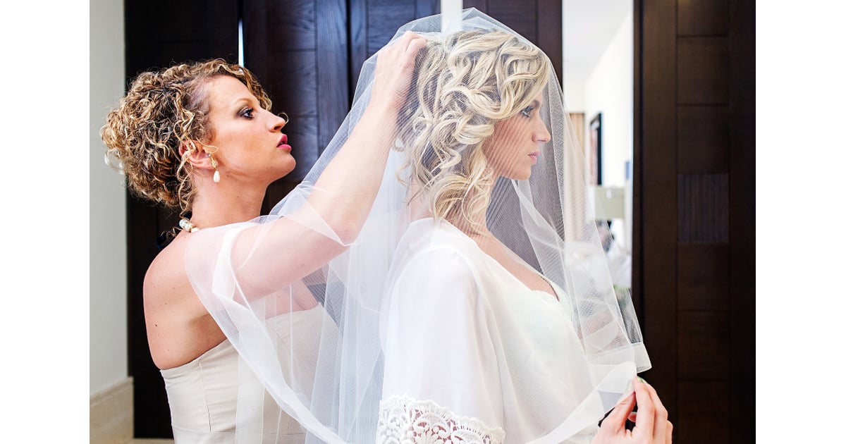 Putting On the Veil Wedding Photo Ideas For Hair and Makeup
