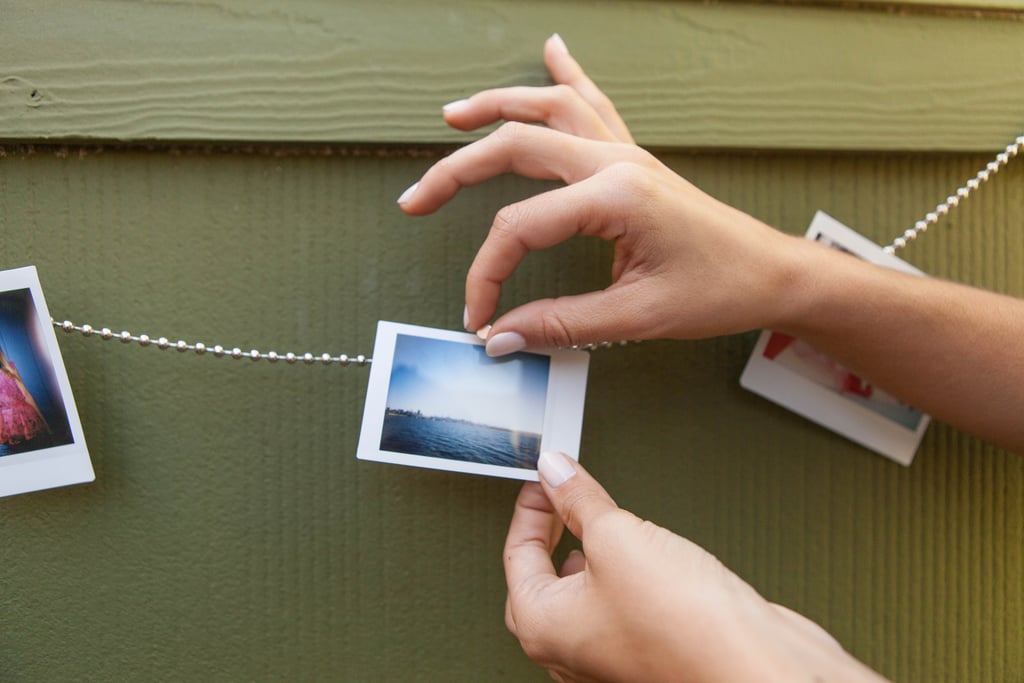 Too many cool photos to display and not enough room to show them all off? This cute How's It Hangin’ Photo Chain ($12) is the perfect solution because it will hold multiple snaps at once. It's pretty affordable, too. 
— LM