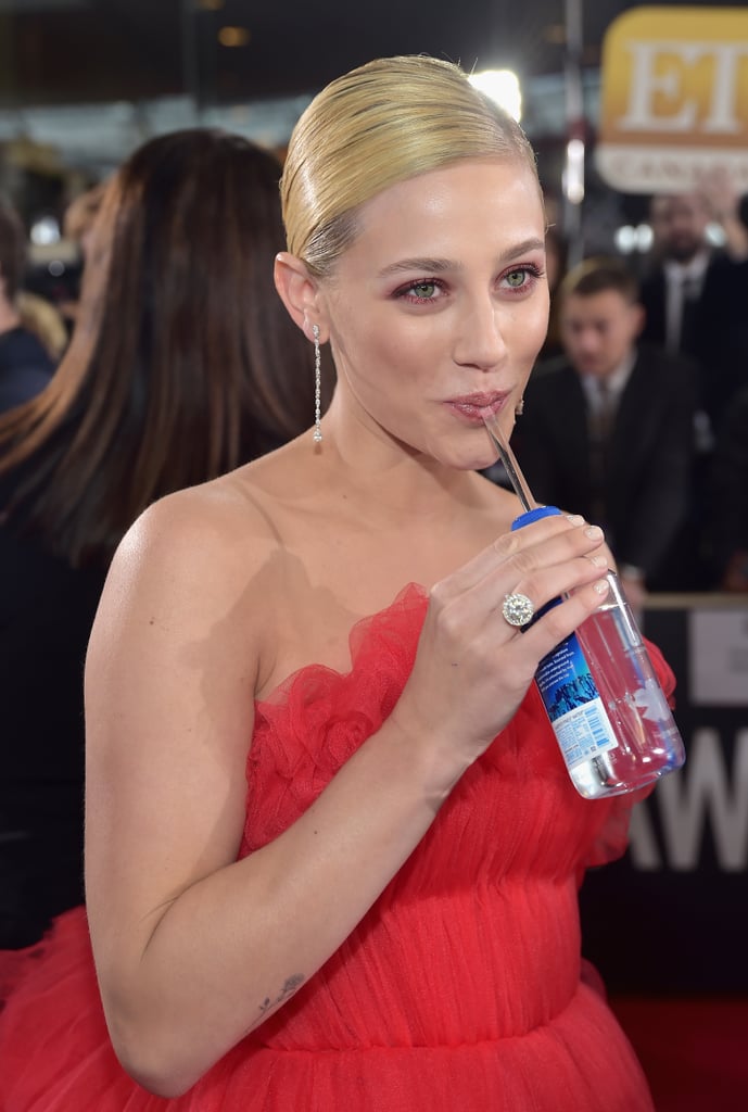 Lili Reinhart made Fiji Water Girl proud as she took a refreshing sip at the 2019 Golden Globes.