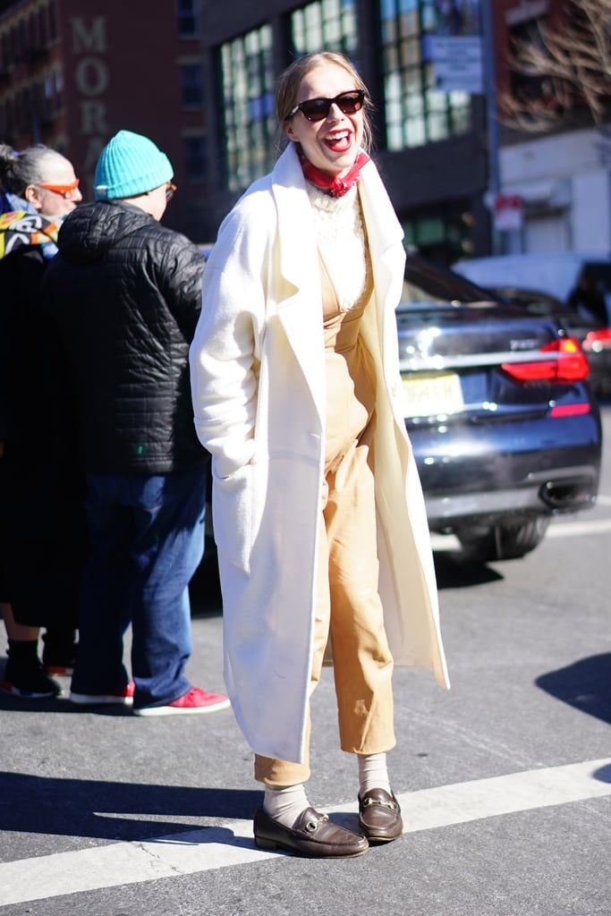 With a Light Jacket, Cream Turtleneck, Socks, and Loafers