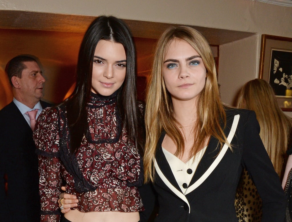 In London, Kendall caught up with fellow model Cara Delevingne at the launch of Love magazine's special editions.
