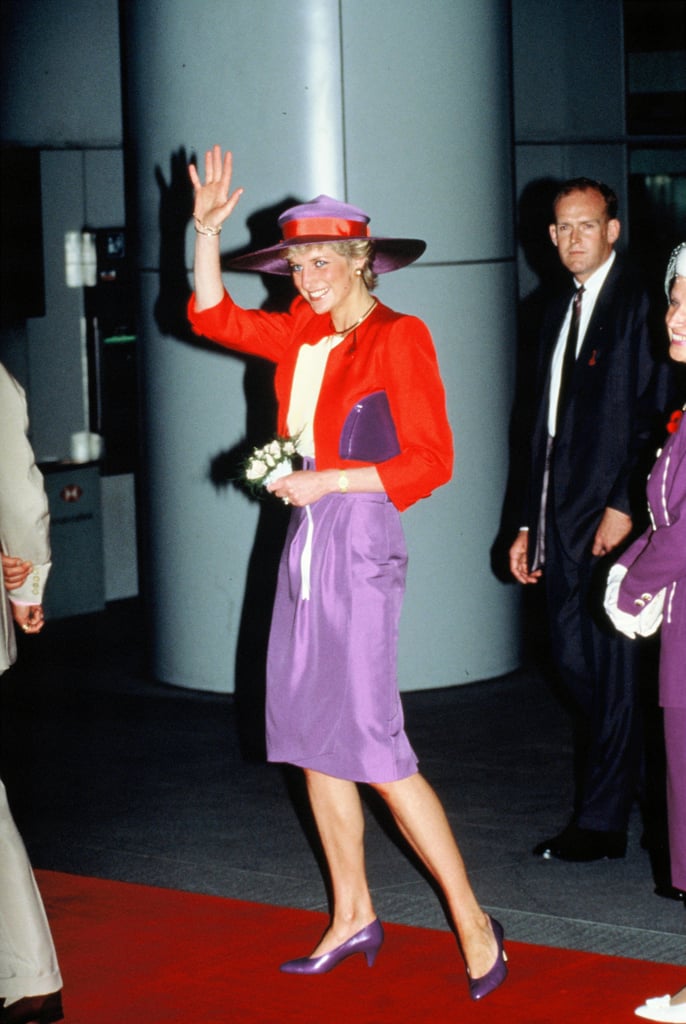 Princess Diana arrived in Hong Kong on tour in 1989 carrying off a purple and red colour clash with ease.