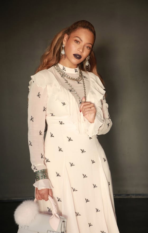 Beyoncé Wearing a White Dress With Birds