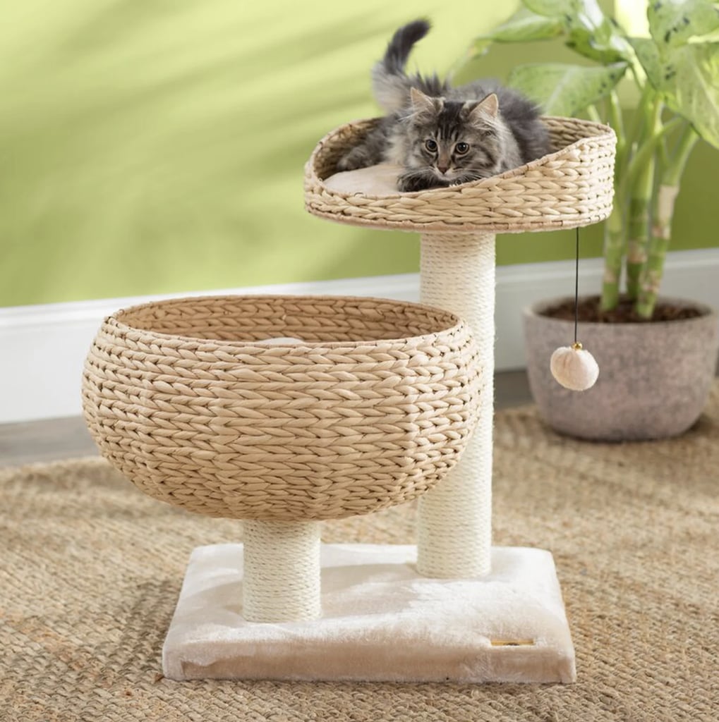 PetPals Handwoven Cat Tree With Perches Scratching Post ($149, originally $169)
If you've been on the fence about purchasing a cat tree, here's your sign to invest in one that won't ruin your decor. Ideal for small cats, this gorgeous tree features a bowl-shaped lounge, a plush pillow, and intricate handweaving that will elevate any space. Most importantly, your furry friend will get plenty of peaceful sleep in the cozy cushion.