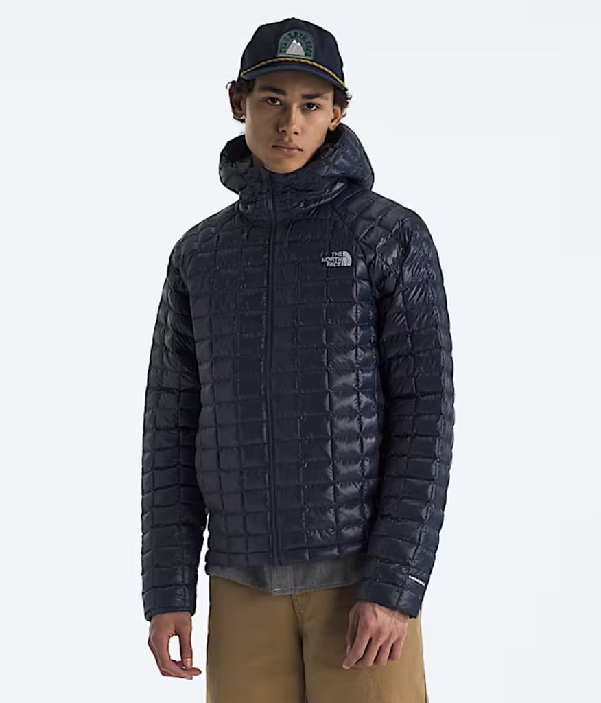 The North Face THERMOBALL™ Hooded Jacket ($250)
The North Face basically made puffers cool, which is why I'm recommending another one. Featuring a classic, yet edgy quilted pattern and THERMOBALL™ fabric, this hooded piece is bound to keep your man warm on any escapade.