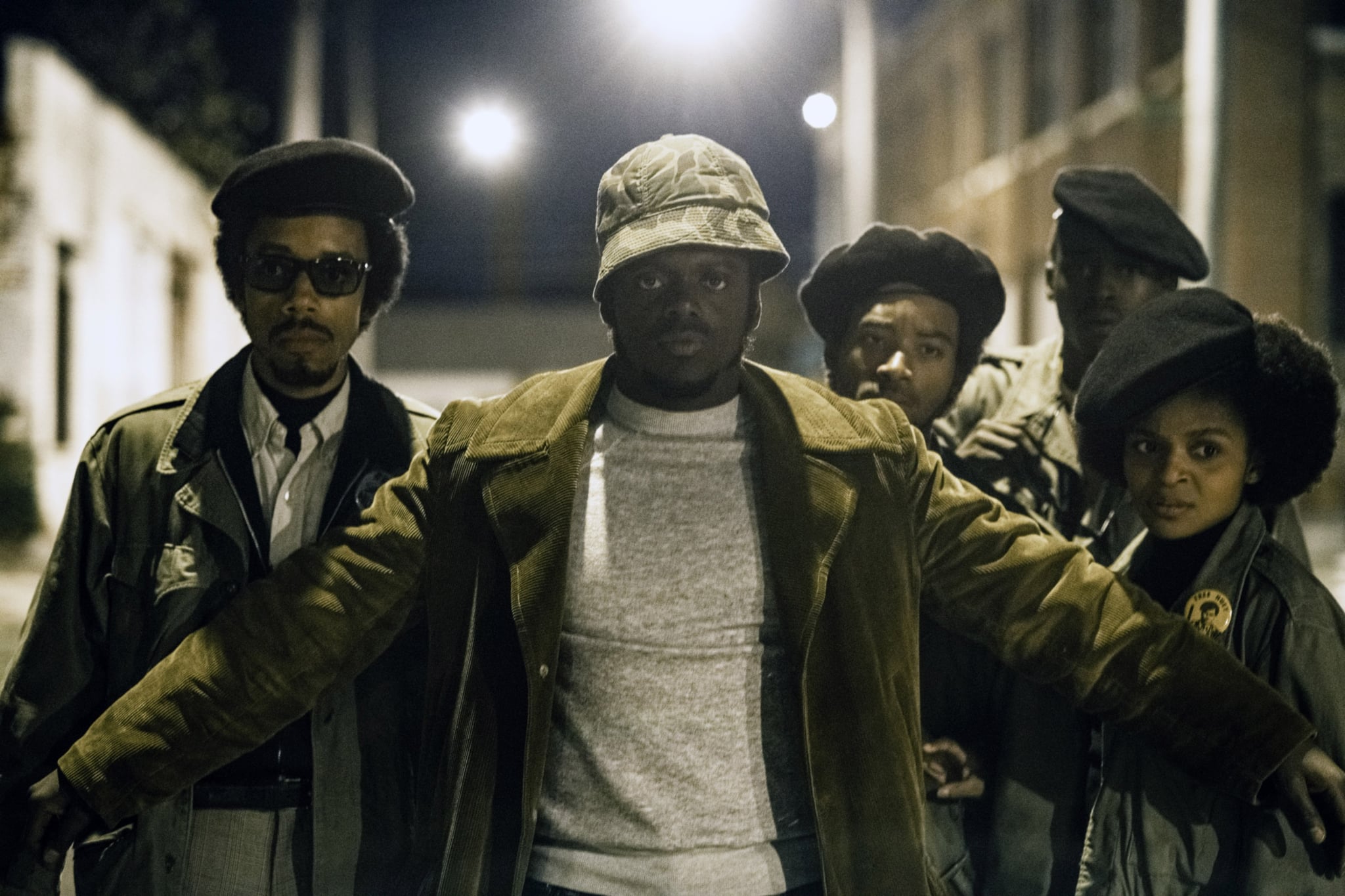 JUDAS AND THE BLACK MESSIAH, Darrell Britt-Gibson (left), Daniel Kaluuya (front), as Fred Hampton, Ashton Sanders (back right), as Jimmy Palmer, Dominique Thorne (right), 2021.  ph: Glen Wilson / Warner Bros. / Courtesy Everett Collection