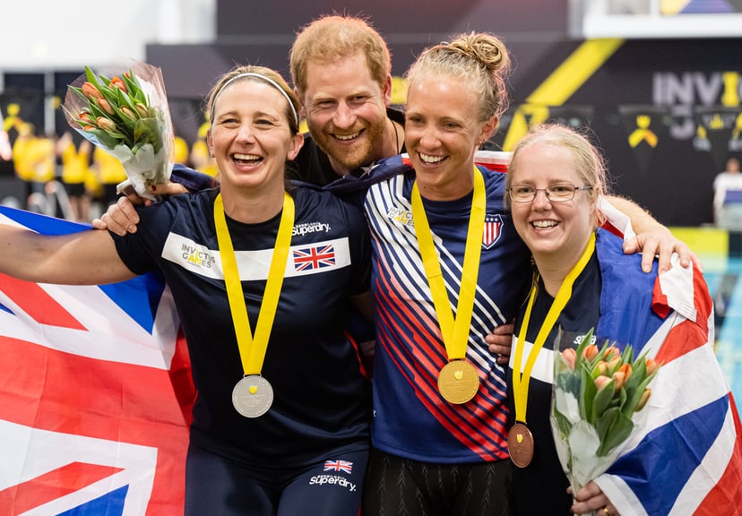 THE HAGUE, NETHERLANDS - APRIL 19:  Prince Harry, Duke of Sussex gives out medals at the swimming competition during day four of the Invictus Games The Hague 2020 at Zuiderpark on April 19, 2022 in The Hague, Netherlands. (Photo by Samir Hussein/WireImage