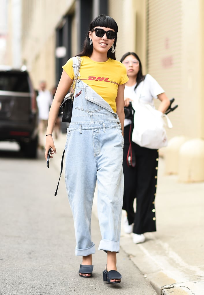 Wear Your Denim Overalls Open on 1 Side to Show Off a Graphic Tee