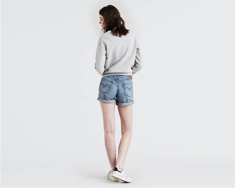 The waist sits just above the belly button, so they're comfortable and flattering. No muffin top! The slightly faded, subtly distressed denim and relaxed fit make them feel like a vintage pair of denim shorts that have been perfectly worn in.