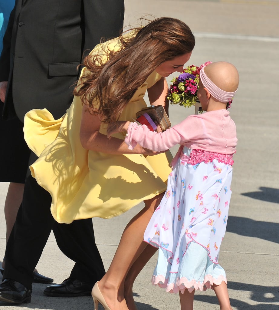 Kate received flowers from 6-year-old Diamond Marshall during a Make a Wish Foundation visit in Canada in July 2011.