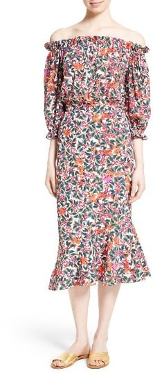 "This Saloni Print Silk Off The Shoulder Dress ($625) is the wedding guest dress you won't get sick of after one wear, can be worn dressed up or laid back, and was made to style with all those dangling Summer earrings." — HWM