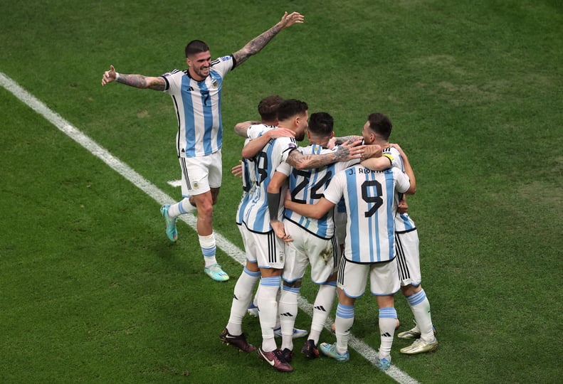 LUSAIL CITY, QATAR - DECEMBER 13:  Julian Alvarez of Argentina celebrates with team mate Lionel Messi after scoring their sides second goal during the FIFA World Cup Qatar 2022 semi final match between Argentina and Croatia at Lusail Stadium on December 1