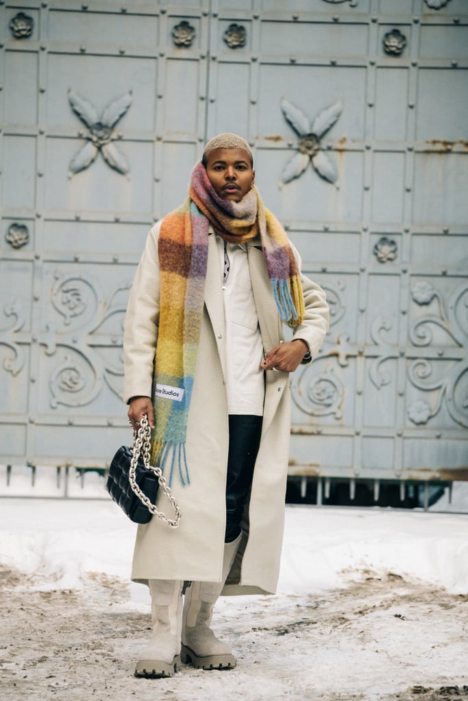 Allow your scarf to be the center of attention when you wrap it multiple times around your neck and "bundle up." The look is cozy, but statement making, especially when your Acne Studio scarf comes in rainbow check.