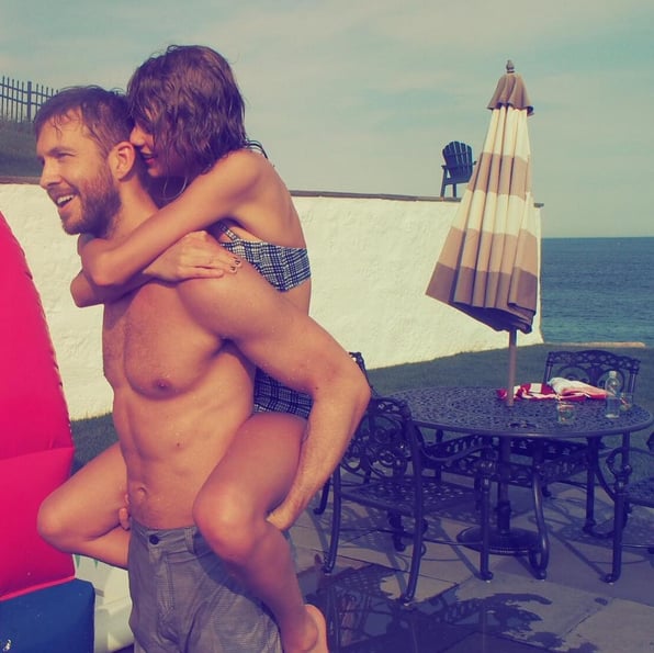 Taylor got a piggyback ride from Calvin during her big Fourth of July weekend with friends.