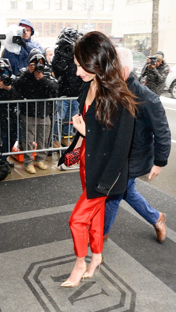 Amal Clooney Red Jumpsuit at Meghan Markle's Baby Shower