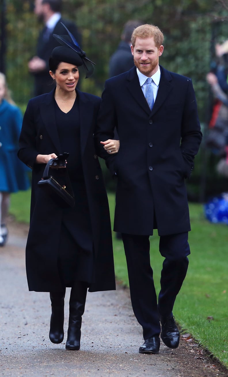 Meghan in a Navy V-Neck Dress