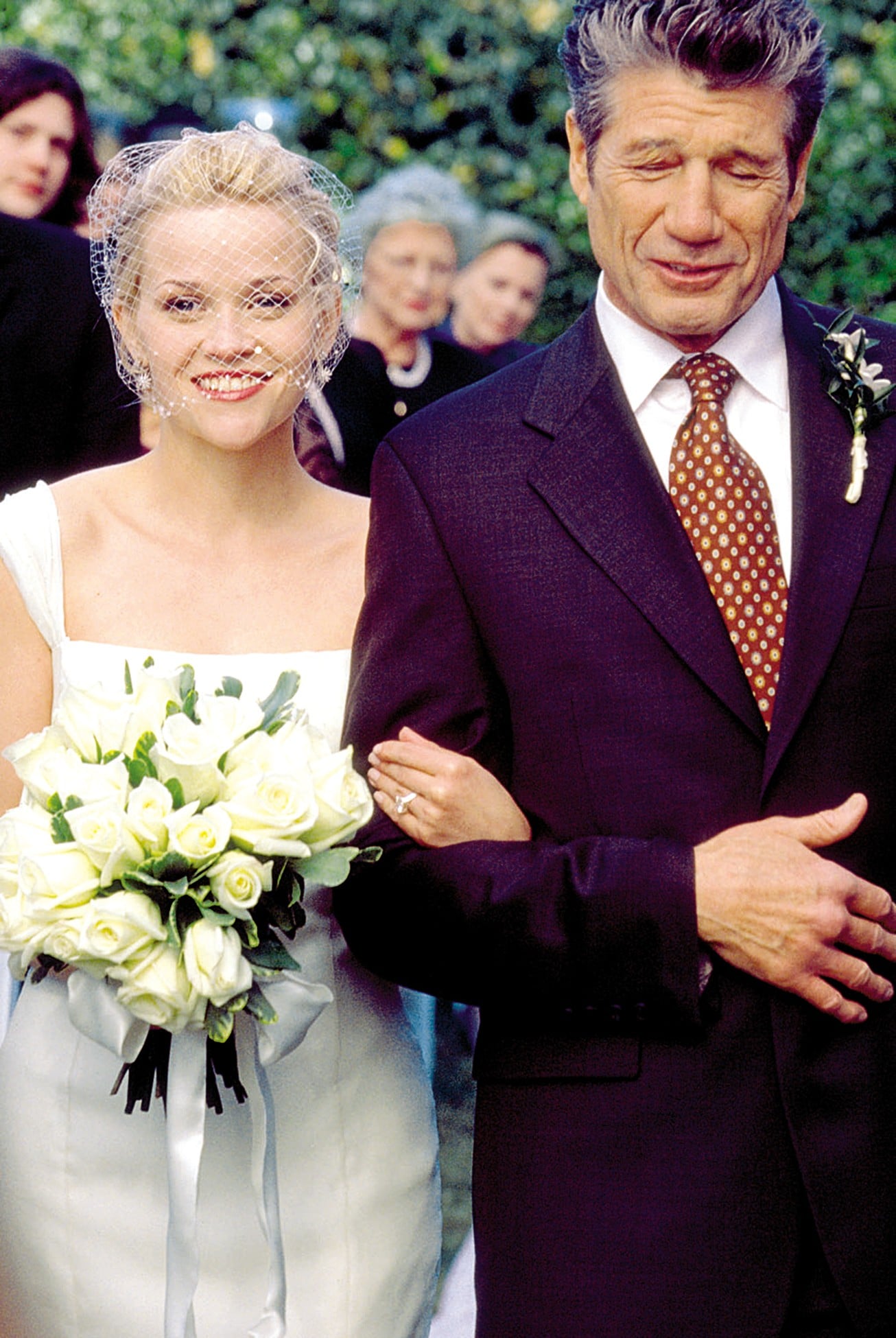 Reese Witherspoon and Fred Ward in Sweet Home Alabama