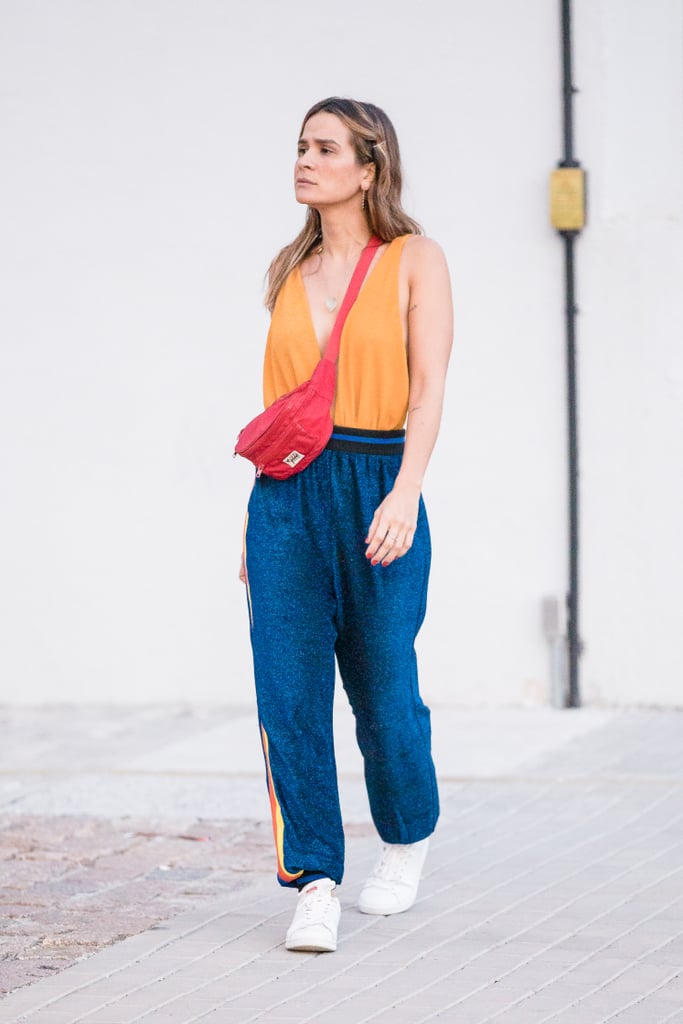 Style a Fanny Pack Around Your Striped Pants and Tank Top