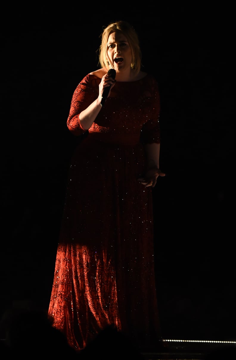 Adele Wore a Dramatic Red Gown to Perform