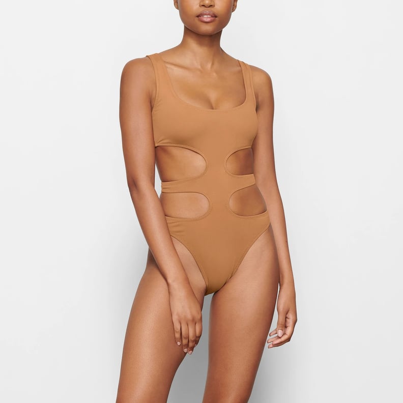 I'm 6'1” and slim – I did a Skims swimsuit haul, the brown one