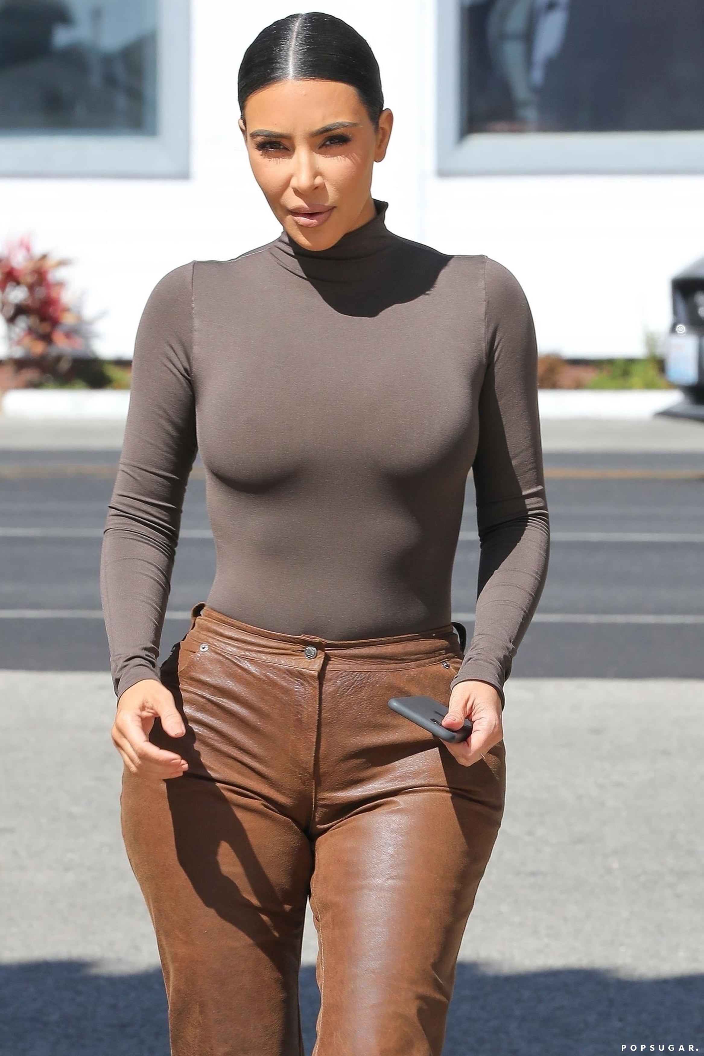 Kim Kardashian Stepped Out in a Skin-Tight Leather Dress