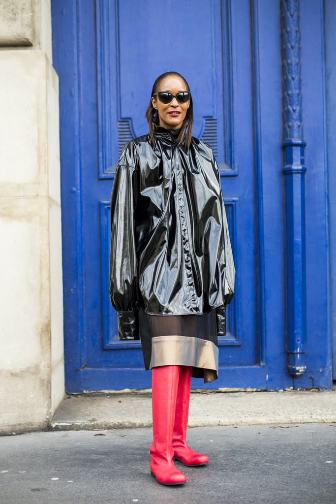 Supersize the effect by wearing your PVC coat with tall boots.