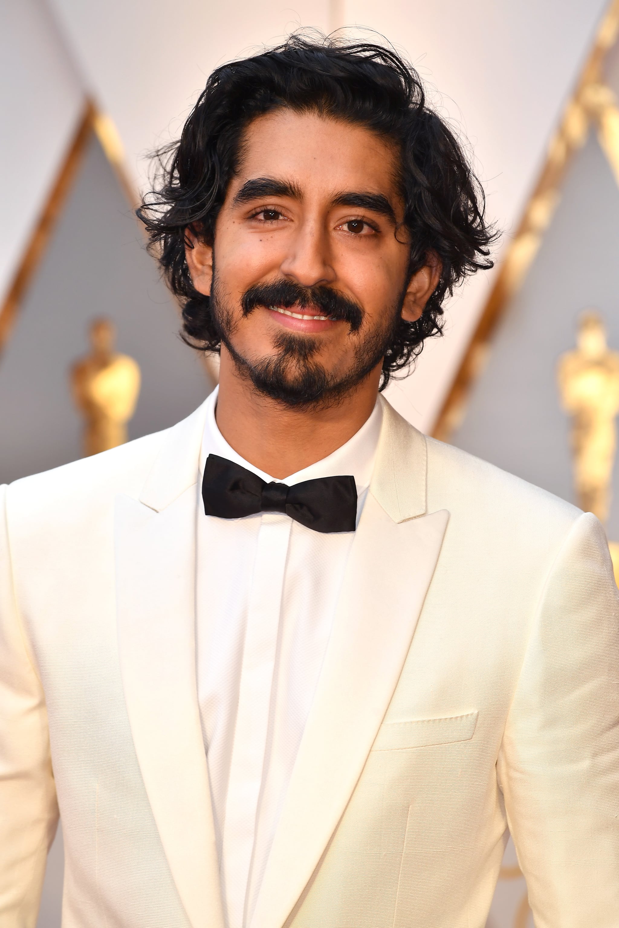 Growing up my Hair I really wanna go for the Dev Patel look but I would  also like your guys opinion on my hair and what hairstyle would suit me   rmalehairadvice