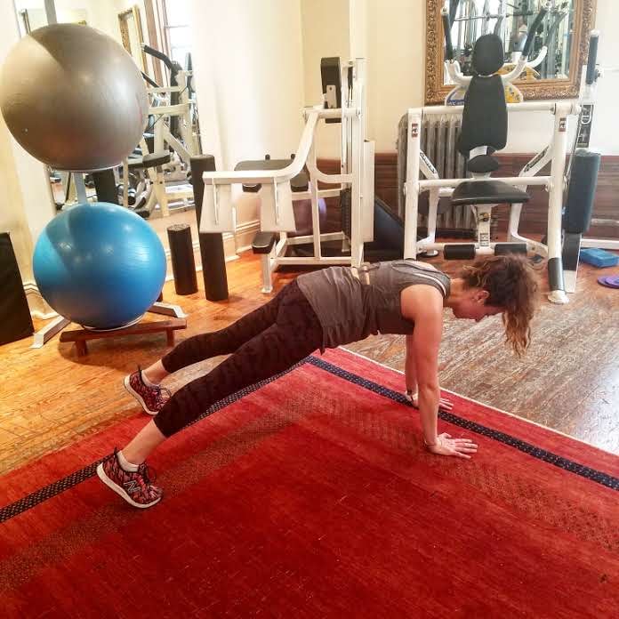 Why it’s effective: “Plank is one of my favorite core-tightening and toning exercises. Walking side to side just raises the level of difficulty and really engages both your core and triceps.”