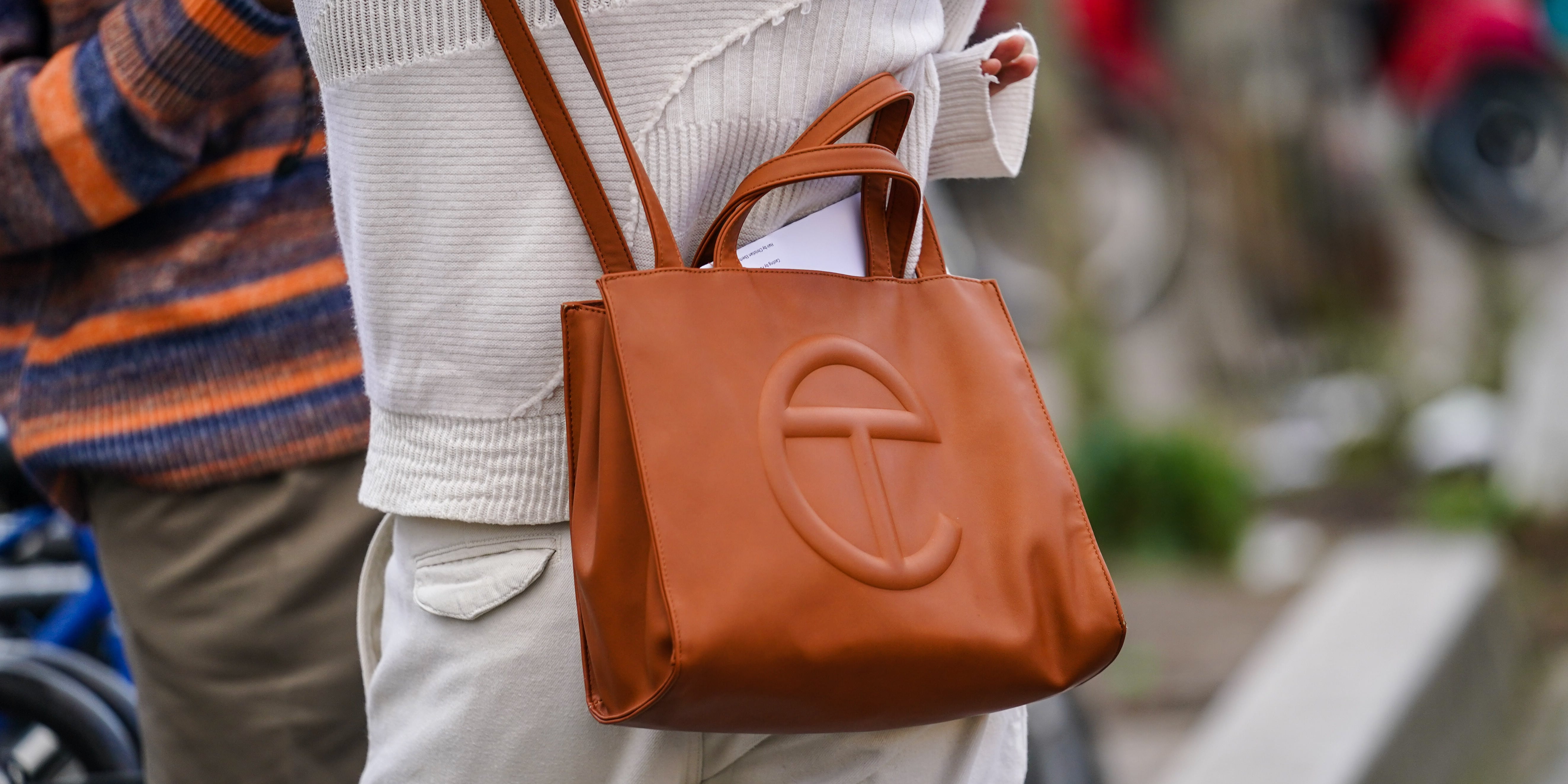 A brown 24/24 Hermes bag as a streetstyle shooting with influencer News  Photo - Getty Images