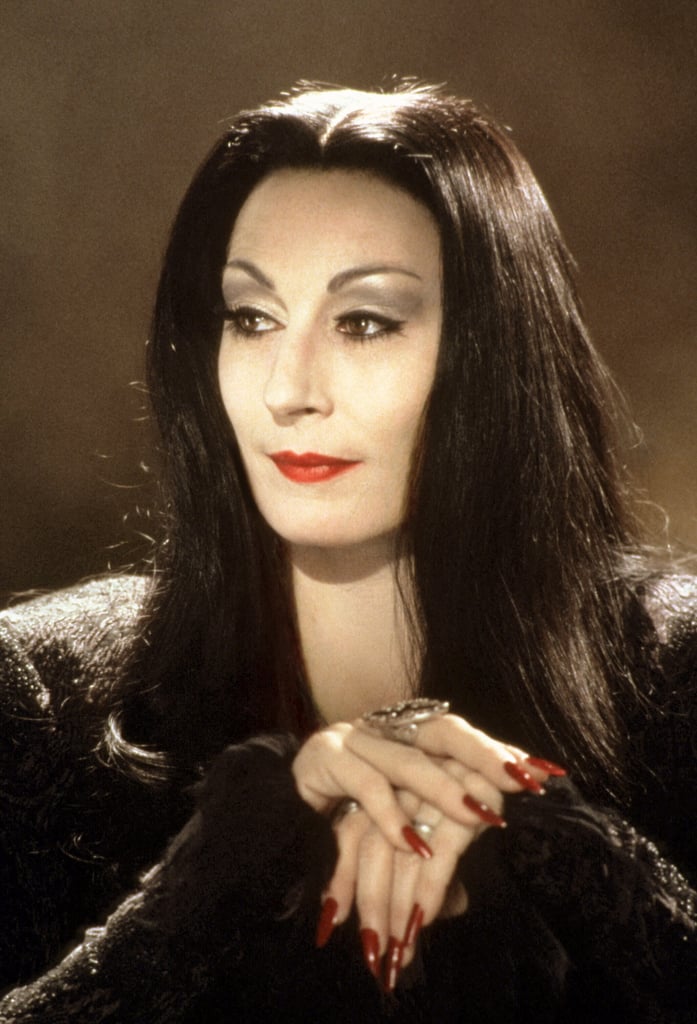 Anjelica Huston as Morticia Addams