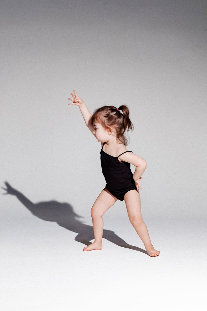 An Adorable 2-Year-Old Wearing a Custom Inamorata Bodysuit