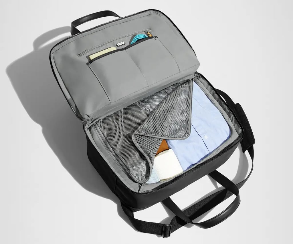Away Overnight Bag ($228)
Away's The Overnight Bag is a water-resistant, durable, sleek option that's perfect for fitting a few outfits, toiletries, and your tech. It has a 15-inch laptop pocket, several interior and exterior pockets to help you stay organized, and a useful trolley sleeve. It has an easy-access clamshell opening and a detachable shoulder strap as well. It comes in six colors, and you even can personalize it.
Pros: Chic design and functional.
Cons: Some find it's hard to carry.
Material: Repellent nylon and leather trim.
Dimensions: 11" height x 17.7" width x 9" depth
Colorways: 6
Who it's best for: The 24-hour traveler.
Extras: Compatible with any Away suitcase and features an interior organization.
What Reviewers Say: "I will use this for travel - both in airplanes and via car. It's perfectly proportioned, it opens like a traditional suitcase with a mesh enclosed compartment on one side - great for carry on with room for all needed/wanted items during flight. I also love how the bag fits over the handles on my AWAY suitcase."
You can also consider getting the The Weekender Bag ($210, originally $248) if you need more space; however, its dimensions may exceed some airline's requirements. The larger option has a 9.4-inch depth, 20.9-inch width, and 11.8-inch height. 
The Overnight Bag can fit around two to three outfits with a 28 liter capacity, whereas The Weekender Bag can fit three to four outfits with a 38 liter capacity.