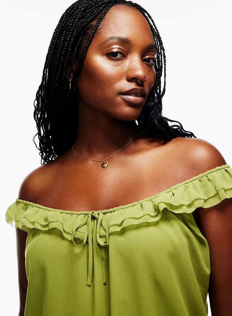 When beige and black seem just too basic, this Wilfred Reverie Blouse ($88) in succulent offers up a pretty green shade that's complemented by a ruffle detail at the neckline.