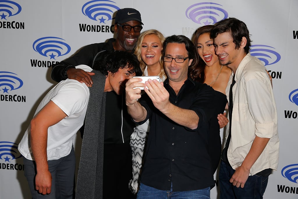 Pictured: Bob Morley, Isaiah Washington, Eliza Taylor, Lindsey Morgan, and Devon Bostick take a selfie with producer Jason Rothenberg.