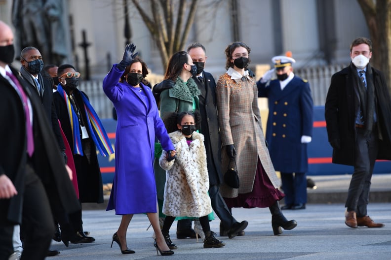 WASHINGTON, DC - JANUARY 20: U.S. Vice President Kamala Harris, husband Doug Emhoff, her great niece Amara, and family members walk the abbreviated parade route after U.S. President Joe Biden's inauguration on January 20, 2021 in Washington, DC. Biden bec