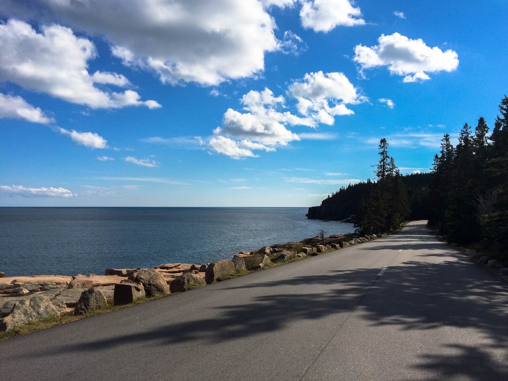 What makes this Acadia National Park so unique is its blissful blend of salty air and lush forests. So whether you're seeking to hike, bike, or get out on the water, it is at this coastal corner that you can do it all. Yet if you are limited on time, a few spots worth exploring are Sand Beach, Jordan Pond, and Cadillac Mountain. 
But let's face it, even if you can do nothing more than hit the road and take in the views from behind the wheel, you're in for a unforgettable ride!