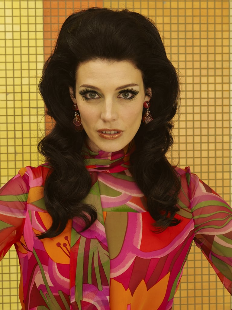 Jessica Paré as Megan Draper.