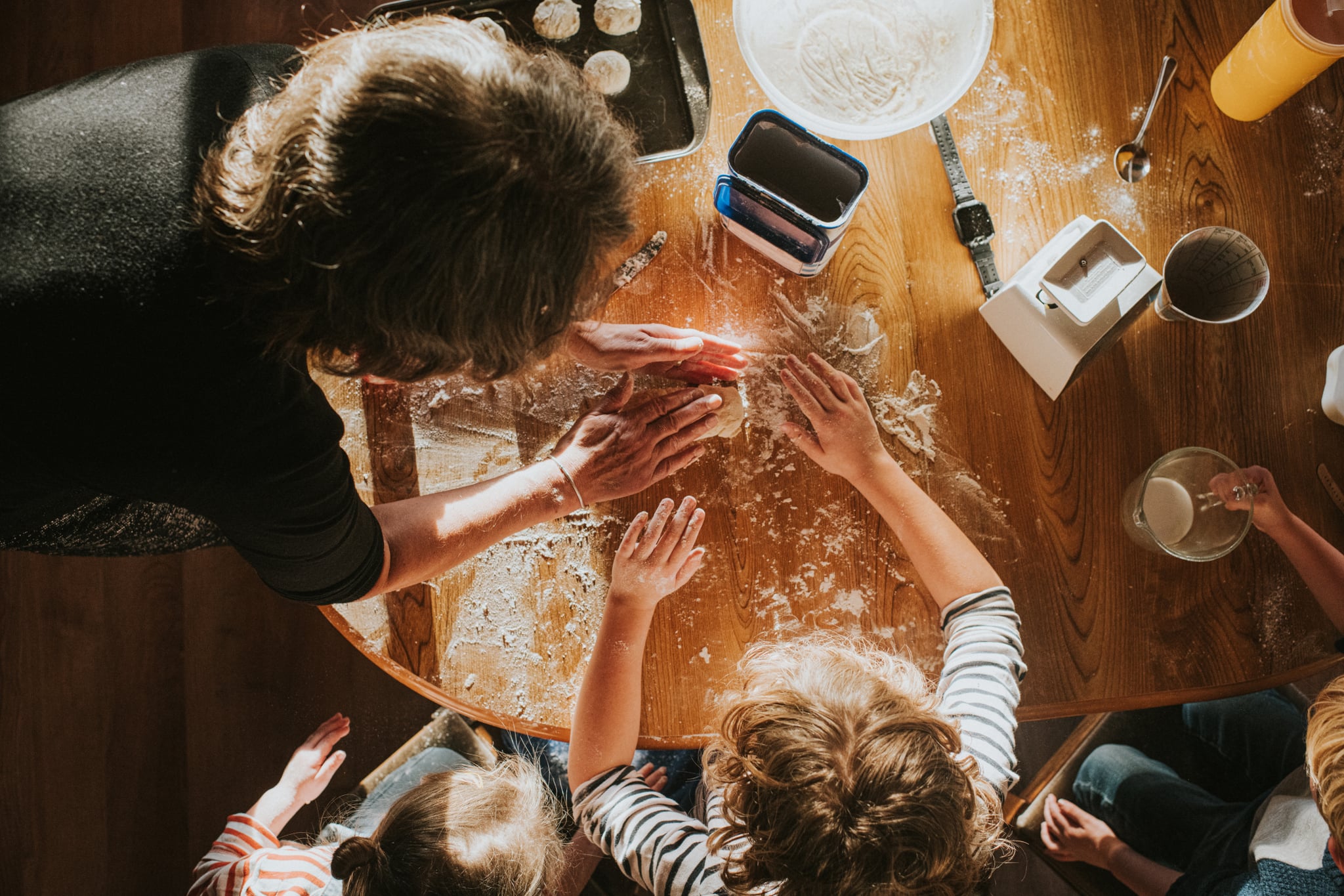 Child and parent baking scones