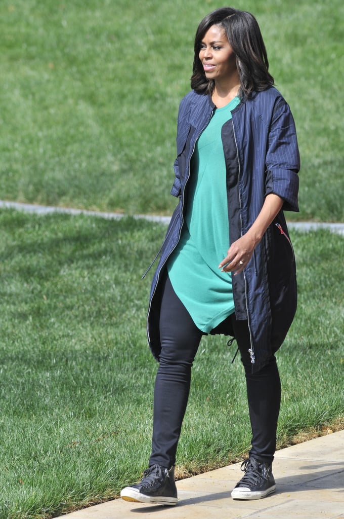 For the White House Easter Egg Roll in 2016, Michelle wore black skinny jeans with a green top, a long jacket, and comfortable sneakers.