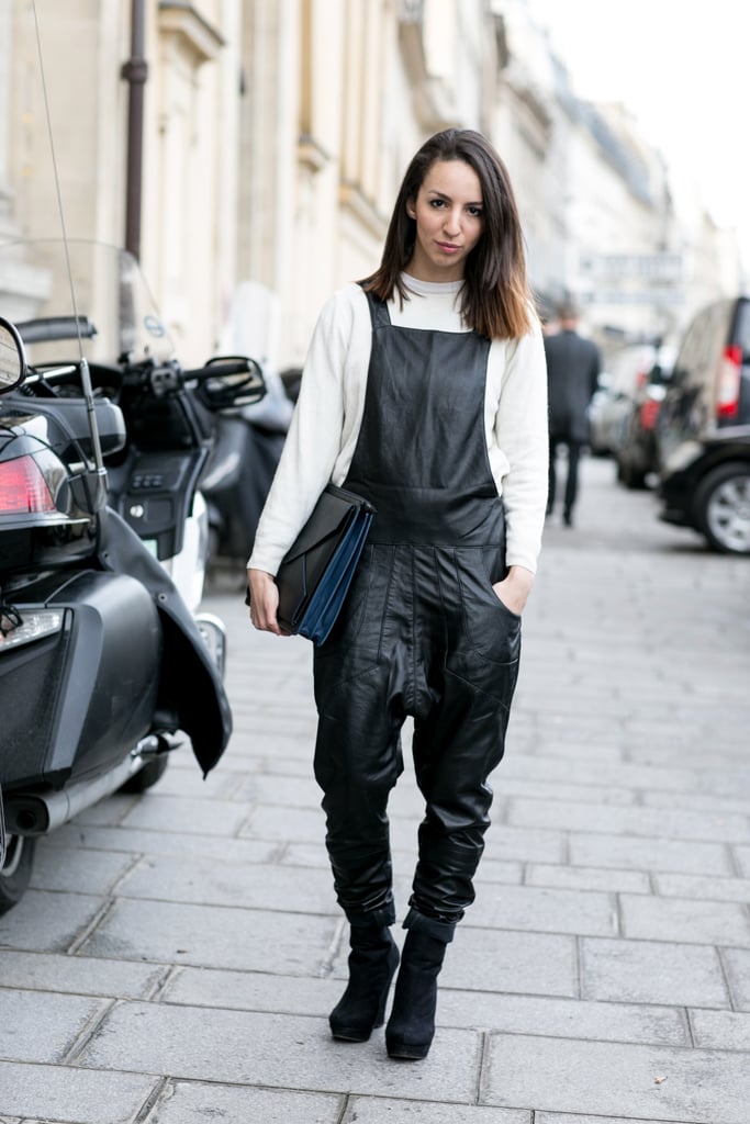 The city girl's overalls were crafted in leather, not denim.