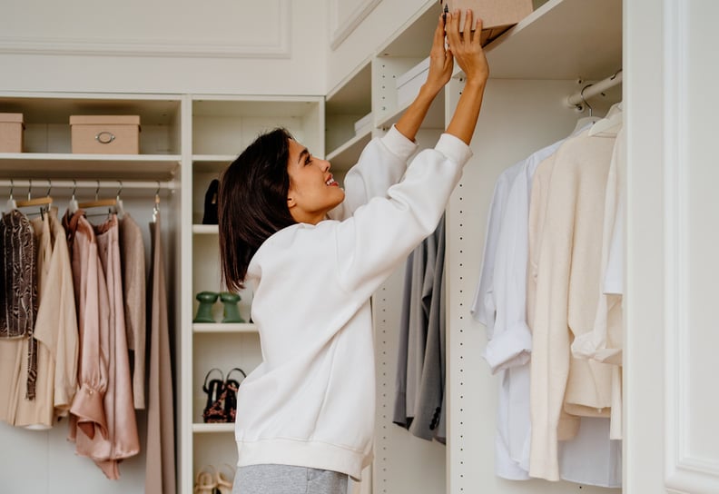 woman organizing her closet