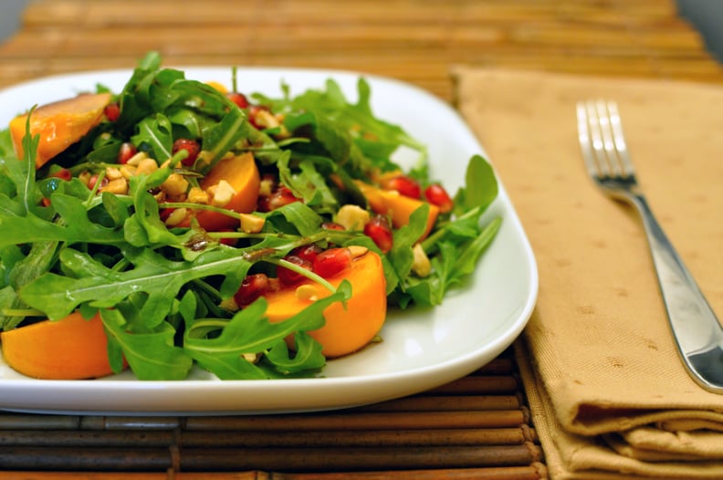 Arugula With Persimmons and Pomegranate Seeds