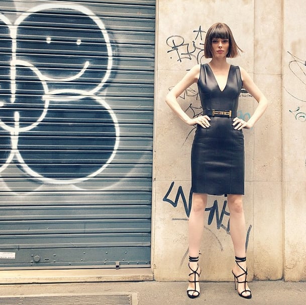 In front of graffiti