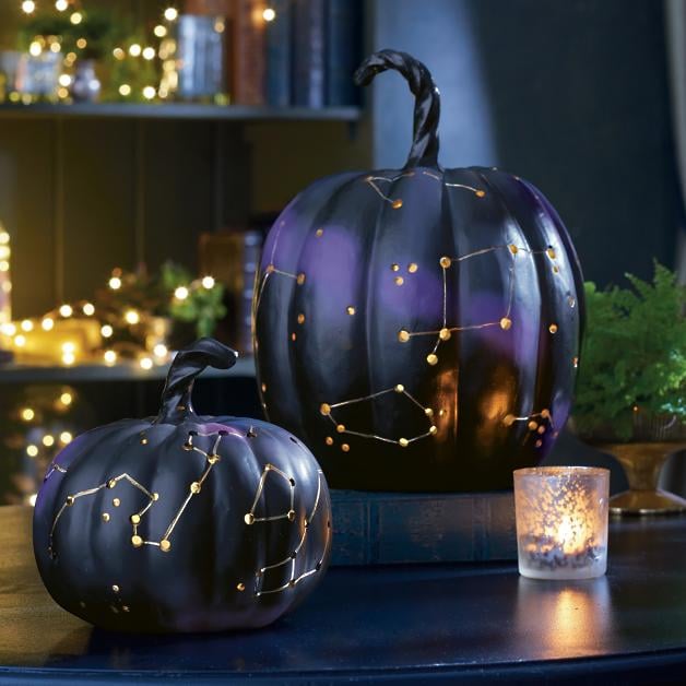 Jack-o'-lanterns come in all shapes, sizes, and designs, and these Constellation Pumpkins from Grandin Road are proof that not all Halloween decorations have to be spooky to send chills down your spine. In fact, these celestial-themed pumpkins are so beautiful, I might just have to leave them up year-round!
The prelit pumpkins — available in small ($39) or large ($79) — are hand-painted, with holes drilled through to let the battery-powered LED lights inside shine through, creating the effect of a twinkling constellation in the night sky. Keep scrolling to take a closer look at these mystical jack-o'-lanterns, and consider adding a few to your cart for your next Halloween bash. Together, they could make a whole galaxy!

    Related:

            
            
                                    
                            

            Etsy Has Killer Halloween Decor From Chilling Candles to Spooky Succulent Holders